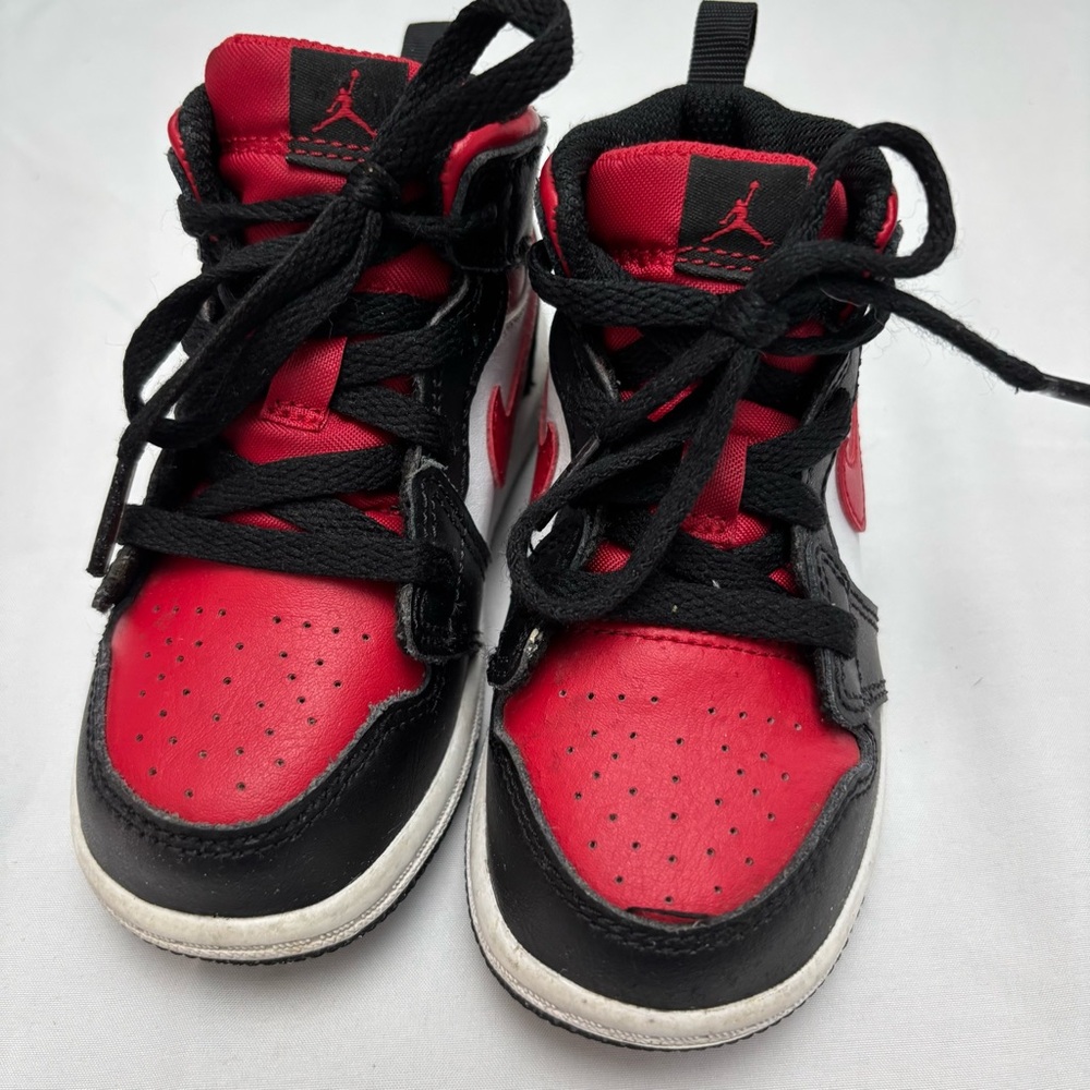Kids Nike Air Jordan 1 Red and Black High-Top Sneakers